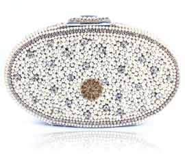 Vogue Crafts and Designs Pvt. Ltd. manufactures Divine Oval Pearl Clutch at wholesale price.